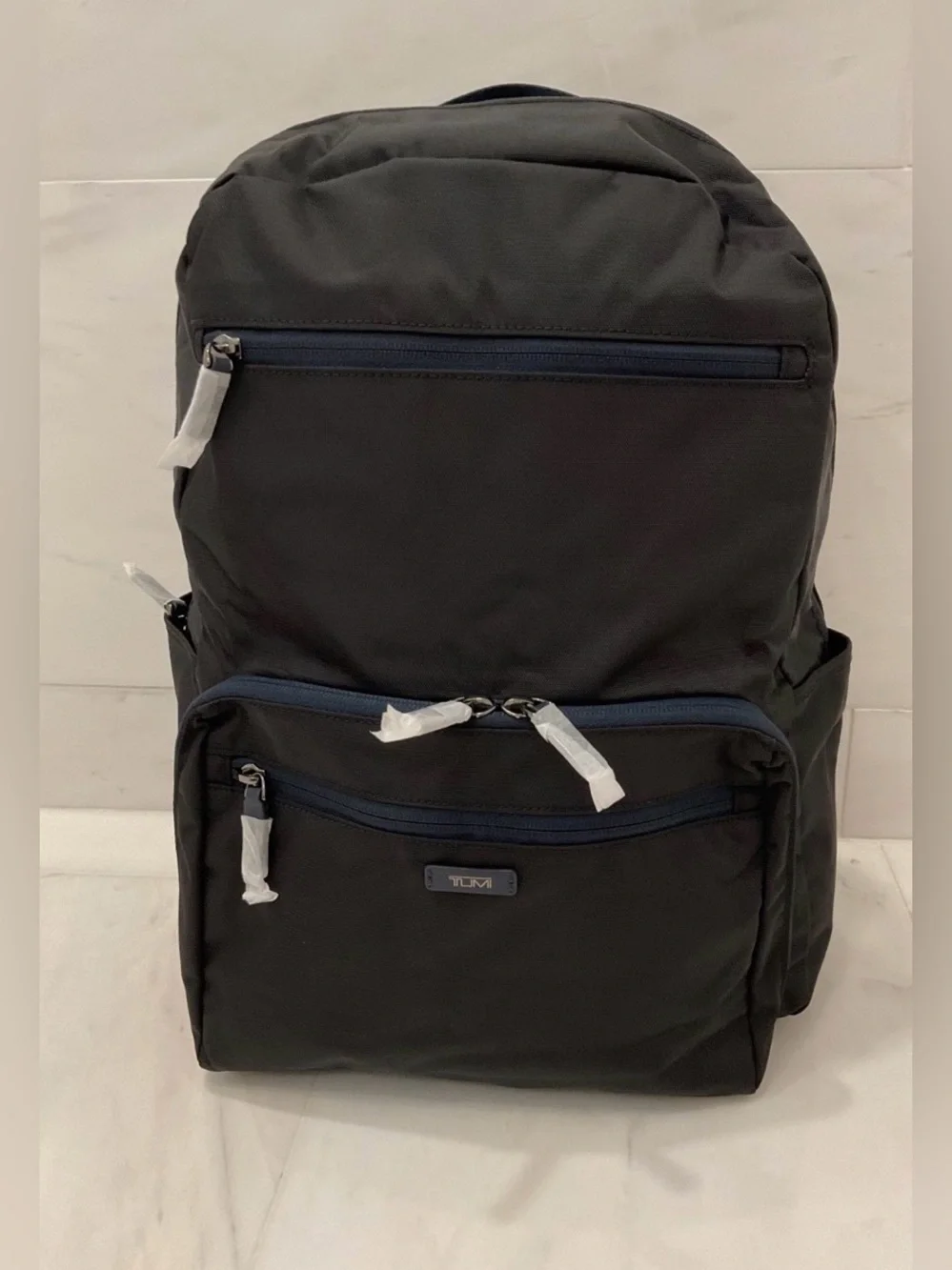 Tumi up sale